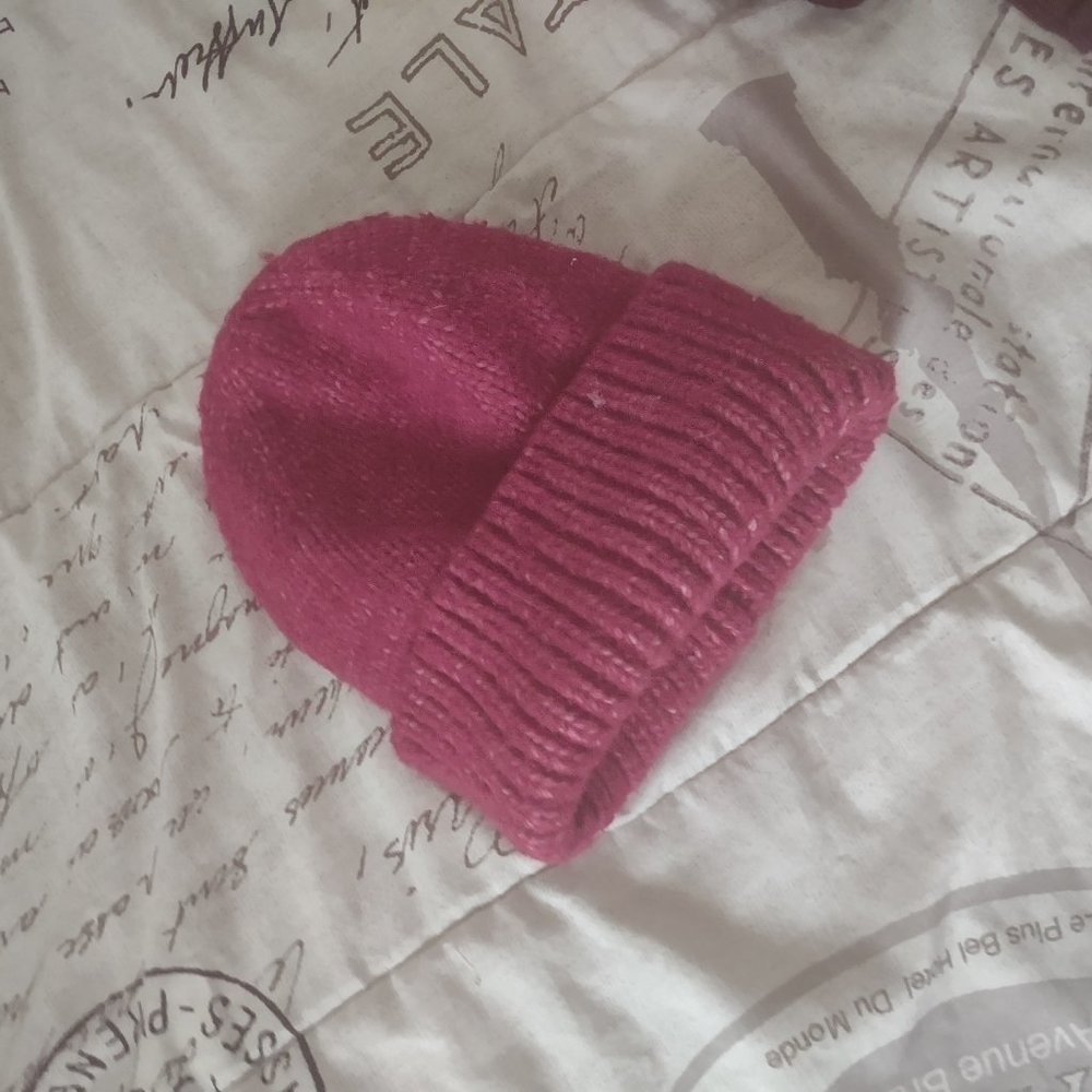 pink and white beanie